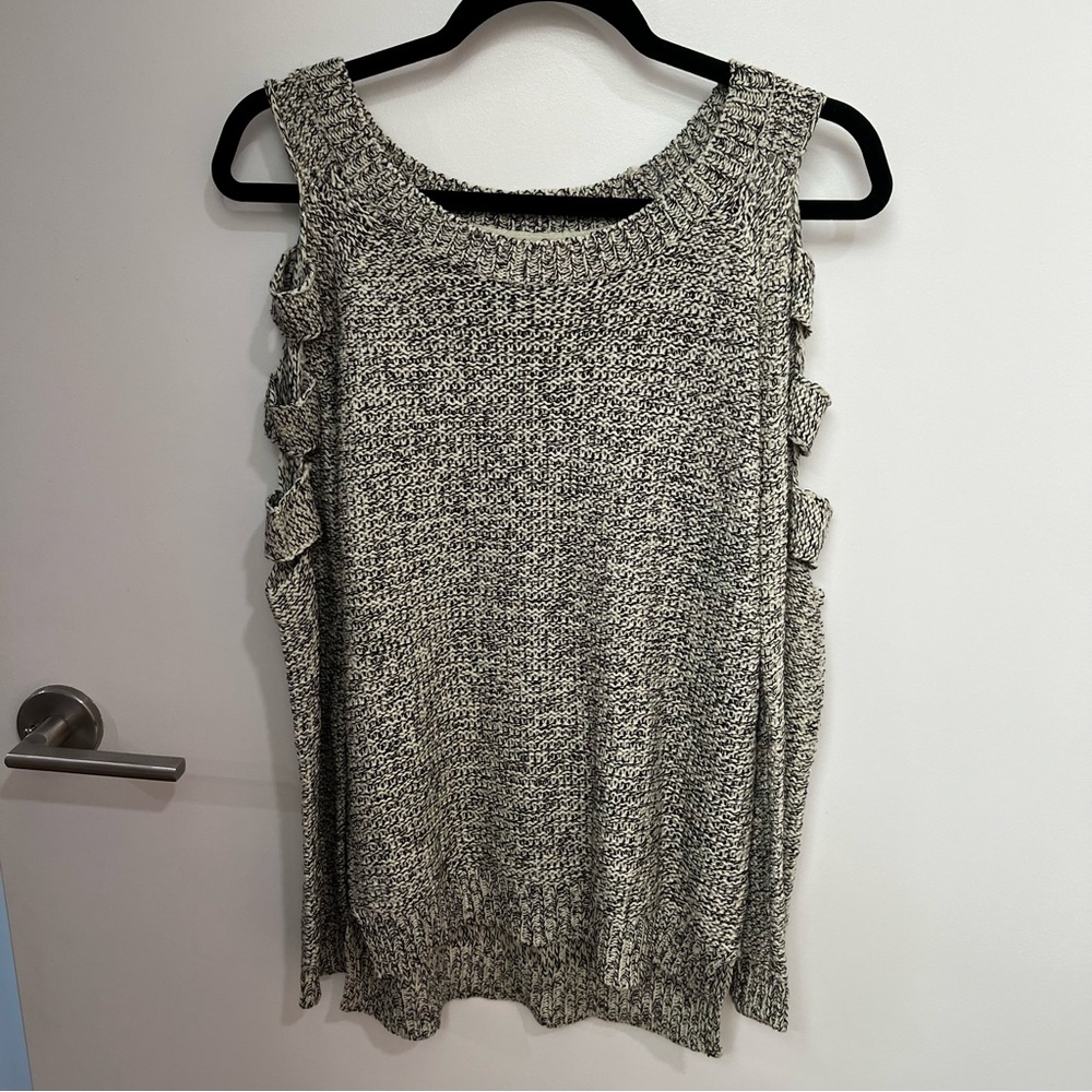 Sweater with arm cut outs